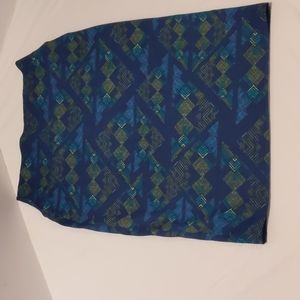 LuLaRoe Skirt Size S Blue with designs of blues greens yellow